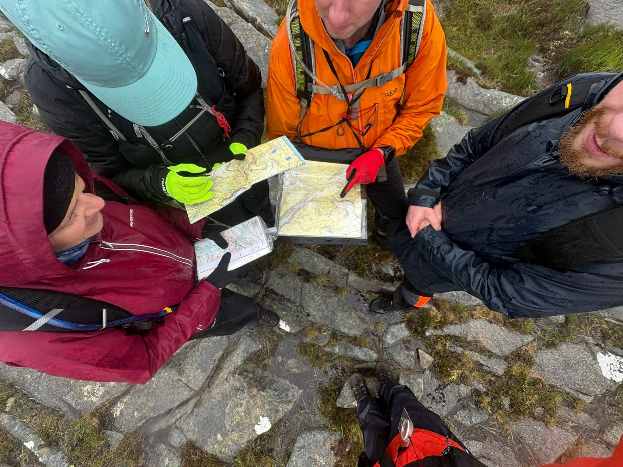 A group practising map and navigation skills